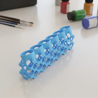 Stojan na lahvičky 22 mm - 6 barev – modrý 3D tištěný produkt v reálném prostředí.