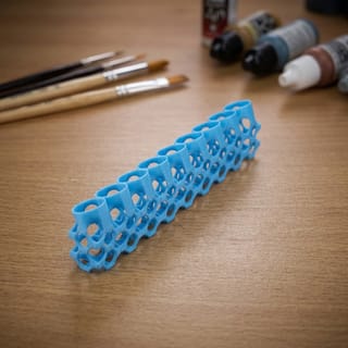 Stojan na lahvičky 22 mm - 9 barev – modrý 3D tištěný produkt v reálném prostředí.